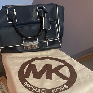 Dark Navy, Michael Kors purse with crossbody capabilities.